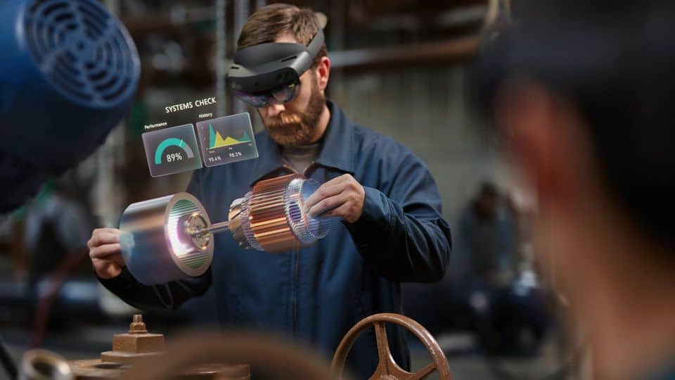 A man working with mixed reality objects.